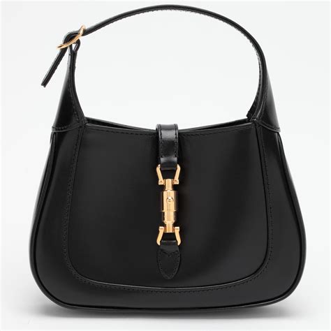 Sac de voyage Jackie 1961 Large en cuir en noir – Gucci.